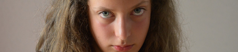 building entrance with neon backlit walls